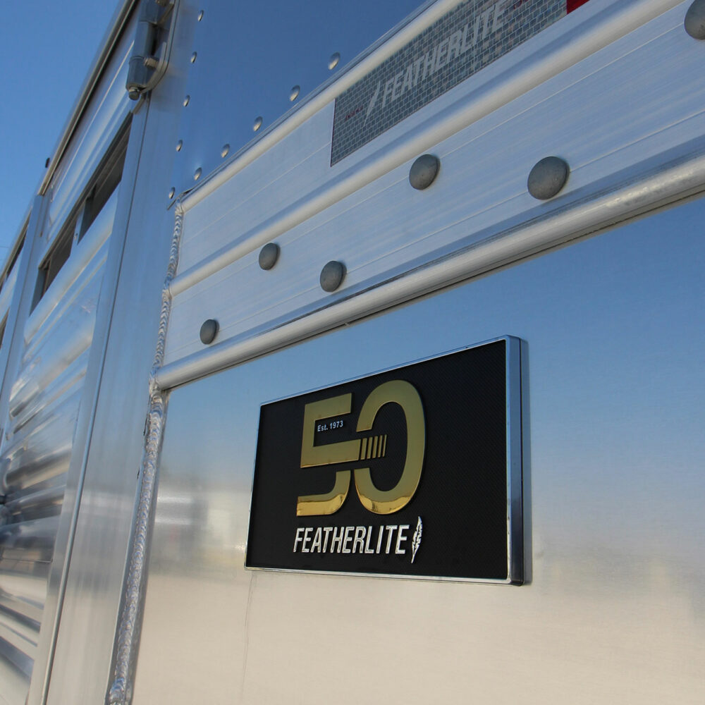 50th emblem on Featherlite stock trailer