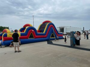 Bouncy houses and obstacle courses were popular with children.